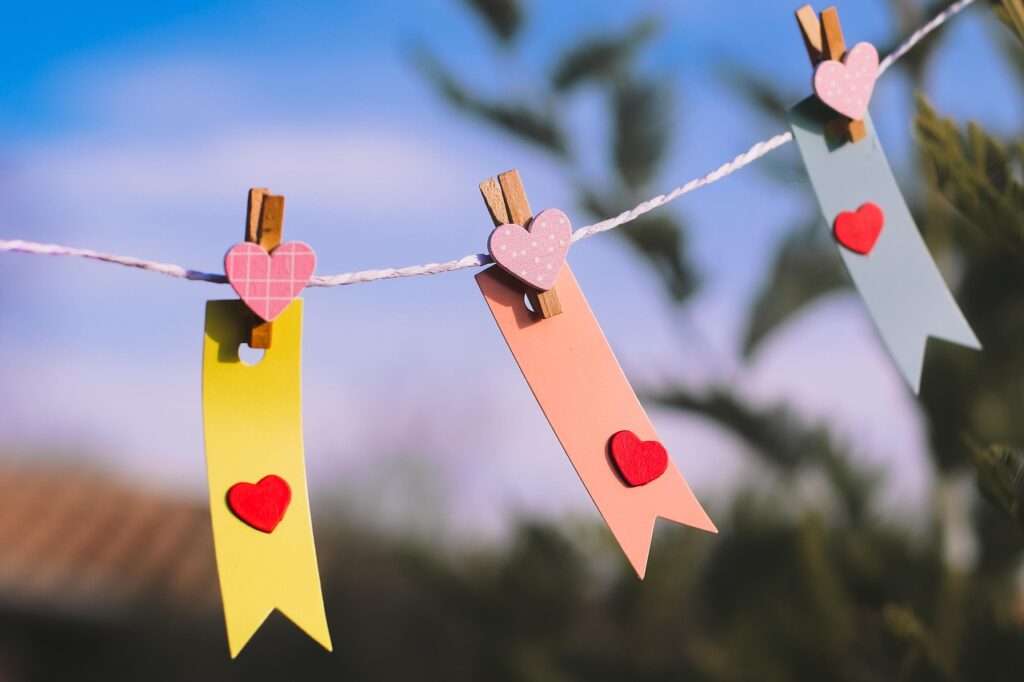 love, hearts, valentine's day, romantic, decoration, colorful, paper tags, clothespins, pastel, handmade, craft, outdoor, greeting, celebration, string, diy, cute, friendship, inspiration, sky, affection, wedding decor, happy, hanging, message