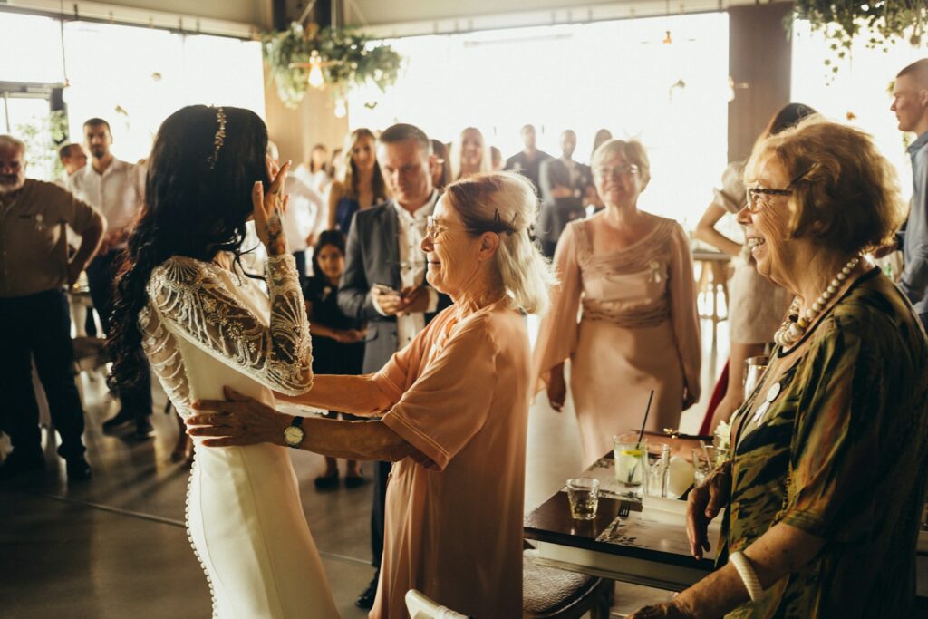 a group of women standing around each other