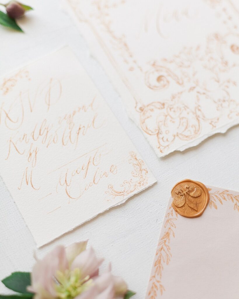 a close up of a wedding stationery on a table